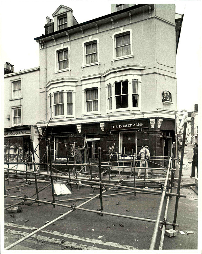 14282 
 Builders scaffolding blown down and blocking at the Dorset Arms on Gardner Street, Brighton 1987 
 Keywords: Argus photo archive. Brighton and Hove Stuff