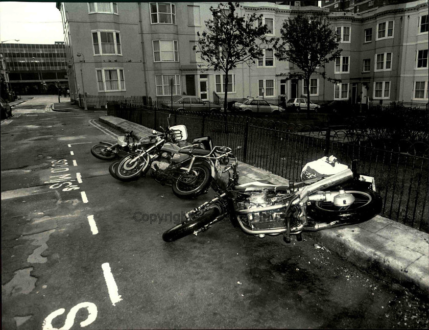 14290 
 Motorcycles blown over in Russell Square, Brighton after the hurricane 1987 
 Keywords: Argus photo archive. Brighton and Hove Stuff