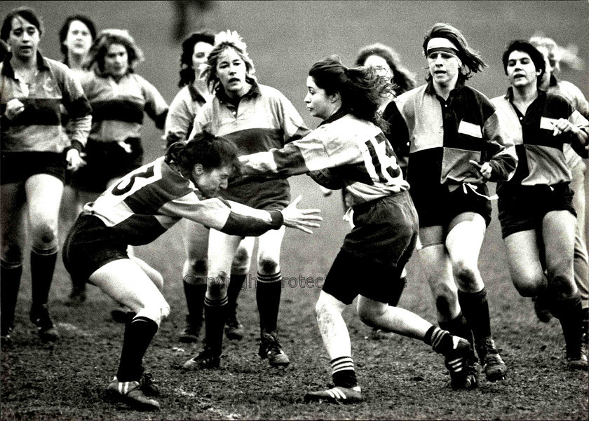 13398 
 Women playing rugby in Hove, Brighton 1992 
 Keywords: Local Sport Rugby Football Cricket School Club Women Men Boys Girls